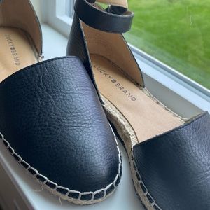 Espadrille ankle-strap flap with open sides